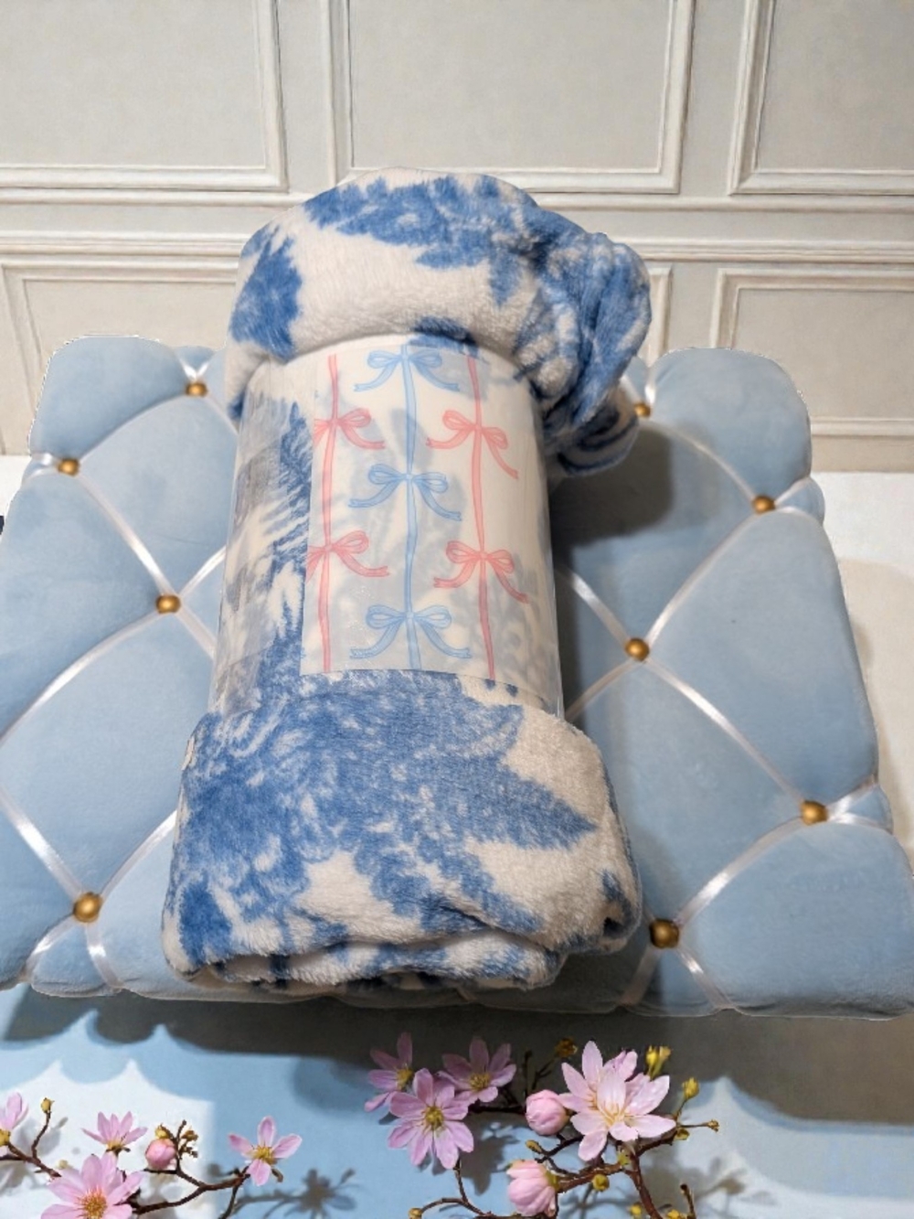 Blue and White Plush Throw Blanket And A Baby Blue Fabric Bulletin Board